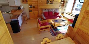 an overhead view of a living room in a tiny house at Résidence Curling A - Par dessus les toits, vue Grande Motte MAE-1164 in Tignes +22 photos