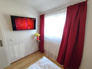 TV a/nebo společenská místnost v ubytování apartment-bb