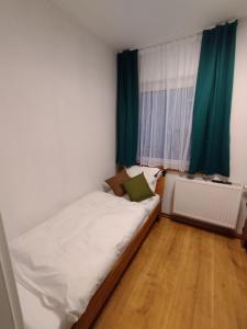 Postel nebo postele na pokoji v ubytování apartment-bb