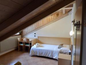 Postel nebo postele na pokoji v ubytování Hotel Garnì Maffei