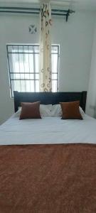 Ένα ή περισσότερα κρεβάτια σε δωμάτιο στο She-goes apartments