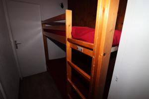 Poschodová posteľ alebo postele v izbe v ubytovaní Résidence Home Club - Studio avec vue sur le lac du Chevril MAE-7504