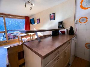Kuchyňa alebo kuchynka v ubytovaní Résidence Palafour - Studio 26-30 m² Standard MAE-7644