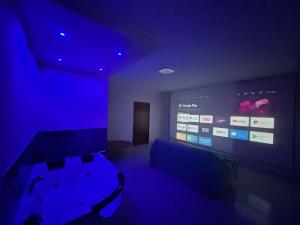 TV a/nebo společenská místnost v ubytování Panorama