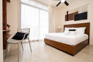 Postel nebo postele na pokoji v ubytování Penthouse with private jungle, pool, downtown + 44 fotografií