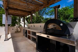 Gril dostupný pro hosty v apartmánu