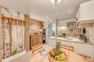 Kuchnia lub aneks kuchenny w obiekcie Résidence Glaciers - 2 pièces 4/5 personnes - 39m² - Sud MAE-5334