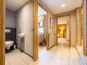 a bathroom with a toilet and a sink at Chalet Millonex - Duplex rénové·skis aux pieds·WIFI·Cheminée MAE-4964 in Tignes
