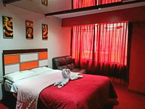 Postel nebo postele na pokoji v ubytování WIRACOCHA Hostal