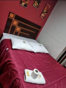 Postel nebo postele na pokoji v ubytování WIRACOCHA Hostal
