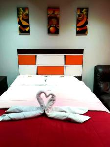 Postel nebo postele na pokoji v ubytování WIRACOCHA Hostal
