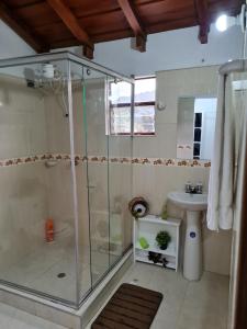 a bathroom with a shower and a sink at Chalet D'Elena in Nobsa +49 photos