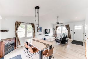 a living room with a table and chairs at The Getaway Lodge in the Blue Ridge Mountains near Roanoke & Bedford in Troutville