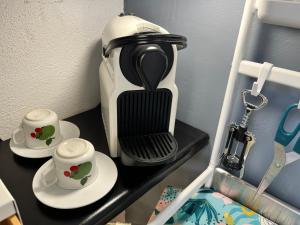 Příslušenství pro přípravu čaje a kávy v ubytování DMC - Alloggio Turistico