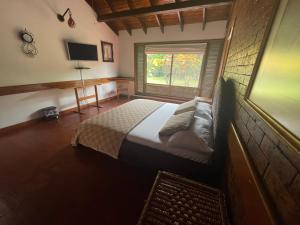 Postel nebo postele na pokoji v ubytování ANAPOIMA Toscana