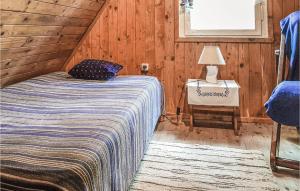 Posteľ alebo postele v izbe v ubytovaní Holiday Home Barczewo Kaplityny Vii