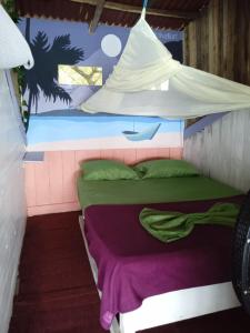 Giường trong phòng chung tại DespertArte espacio de Arte y Hospedaje +95 ảnh