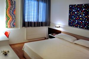 Hotel Garni Centro客房内的一张或多张床位