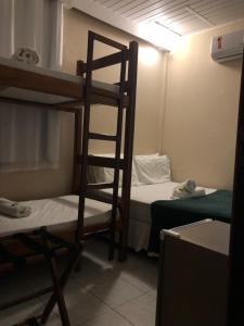 Postel nebo postele na pokoji v ubytování Morro de São Paulo Hospedagens