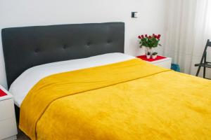 Postel nebo postele na pokoji v ubytování Stanza tecnologica