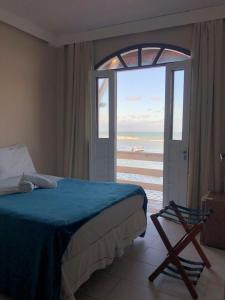 Postel nebo postele na pokoji v ubytování Morro de São Paulo Hospedagens + 37 fotografií