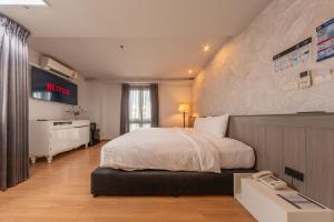 TV a/nebo společenská místnost v ubytování A.LIST HOTEL