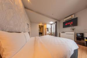 Postel nebo postele na pokoji v ubytování A.LIST HOTEL