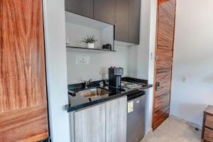 Kuchyň nebo kuchyňský kout v ubytování Hotel NG