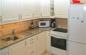 Kuchyň nebo kuchyňský kout v ubytování Holiday Home Straumgjerde Fjellsetra