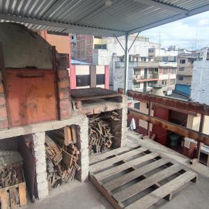Balkón nebo terasa v ubytování Conexión Urbana en el centro de Ambato
