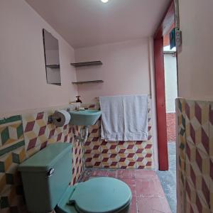 Posezení v ubytování Conexión Urbana en el centro de Ambato