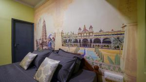 Voodi või voodid majutusasutuse Trippr Mysuru toas