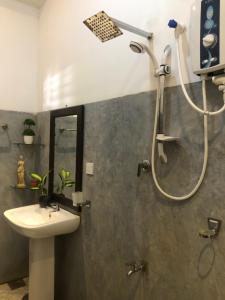 a bathroom with a shower and a sink at Villa D40 in Weligama +41 photos