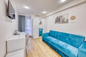 Et tv og/eller underholdning på Maison Heritage Hotel