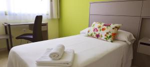 Postel nebo postele na pokoji v ubytování Hotel Primavera