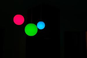 a couple of traffic lights in the dark at Villa By Nature in Yawatano
