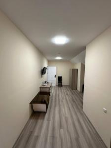 Televiisor ja/või meelelahutuskeskus majutusasutuses Olive hotel