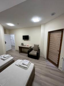Voodi või voodid majutusasutuse Olive hotel toas