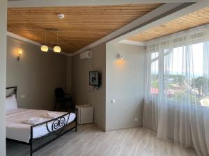 Postel nebo postele na pokoji v ubytování Argo Hotel