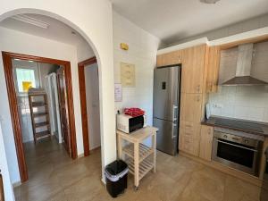 Kuchyň nebo kuchyňský kout v ubytování Villa Maravilla