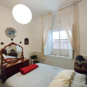 Fotografie z fotogalerie ubytování Piso en el casco antiguo con patio privado v destinaci Seville