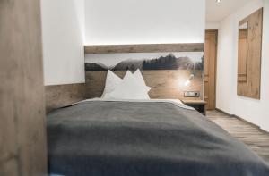 Postel nebo postele na pokoji v ubytování Landhotel Waldeck