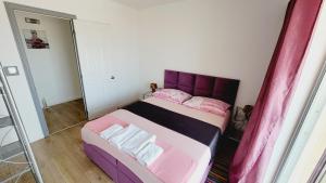Postel nebo postele na pokoji v ubytování Apartments Veronika