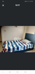 Postel nebo postele na pokoji v ubytování شاليه بالساحل