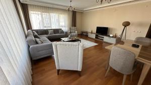 TV a/nebo společenská místnost v ubytování Corner luxury suit