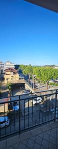 a view of a parking lot from a balcony at Forte2110 in Misano Adriatico
