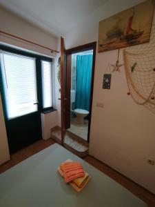 Koupelna v ubytování Rooms Tia