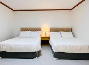 Postel nebo postele na pokoji v ubytování Gyeongju MaMa + 55 fotografií