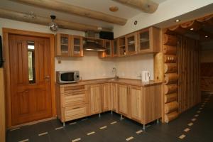 Kuchyň nebo kuchyňský kout v ubytování Smaidas apartamenti