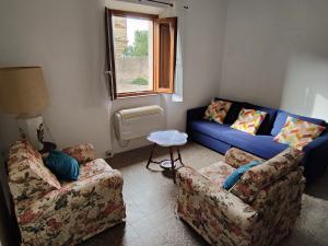 Posezení v ubytování Populonia corso apartment + 16 fotografií